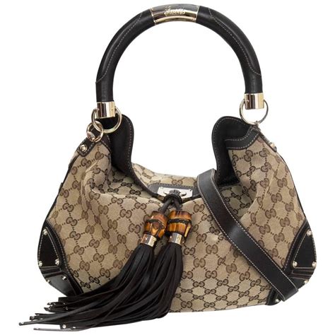 gucci purse with tassel